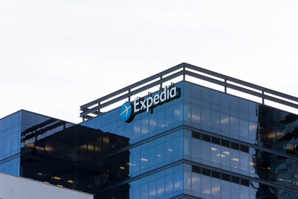 Expedia website showing travel booking options for flights, hotels, and vacation packages.